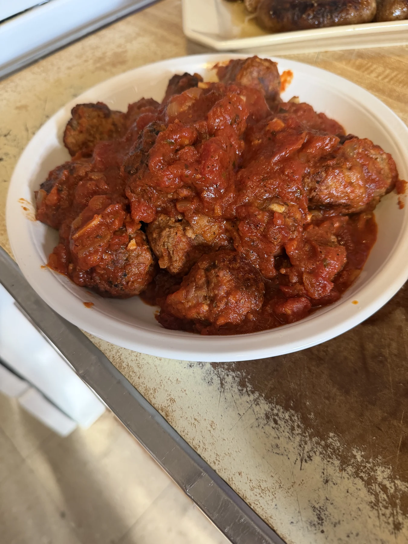 Food with red sauce on a plate